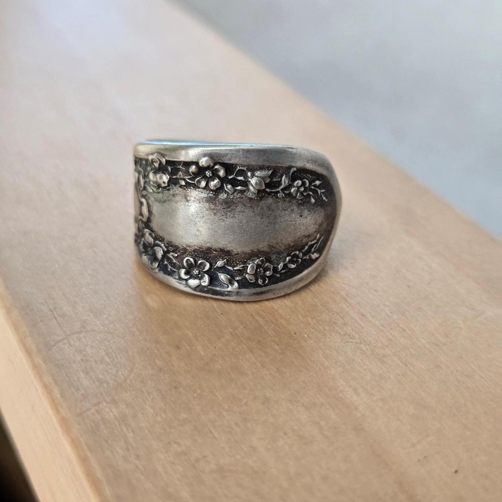 vintage spoon ring with floral design. approximately size 8.5